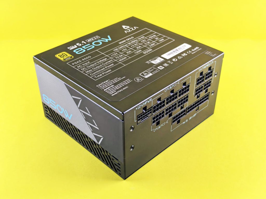 Compact 850W PSU with 80 Plus Gold certification on yellow backdrop, efficient for gaming PCs.
